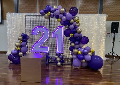 purple neon 21 with balloons