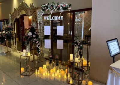 event welcome sign and candles